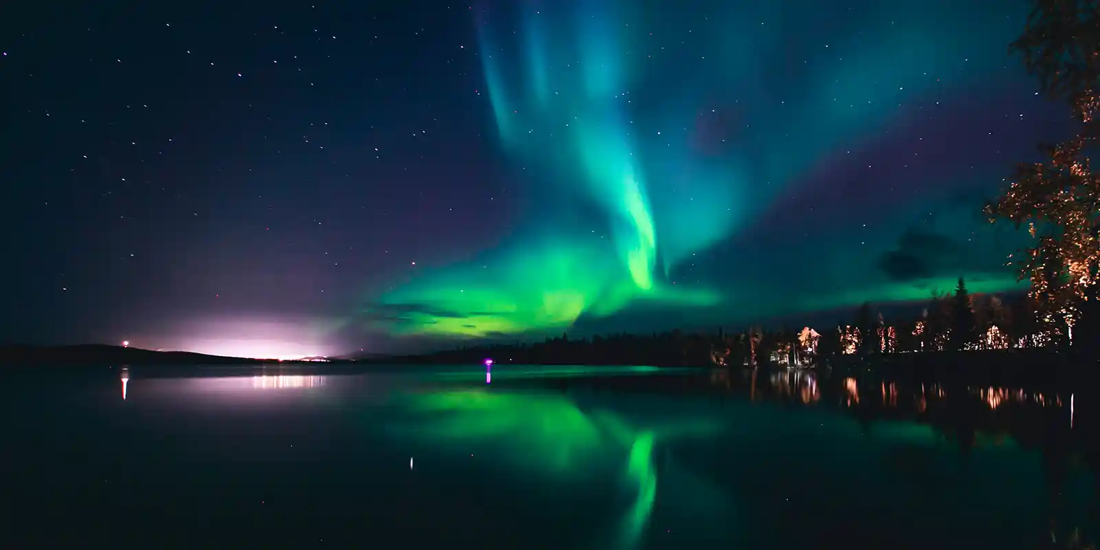 Northern lights over a village in Norway