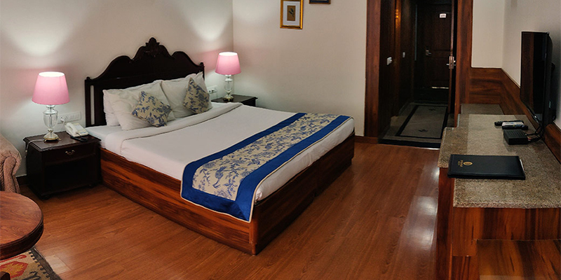 Deluxe bedroom at Udai Vilas Palace in India