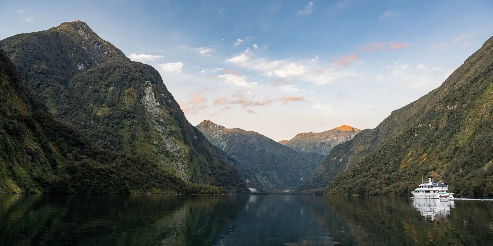 The Heritage Explorer sailing in the fjords of New Zealand.