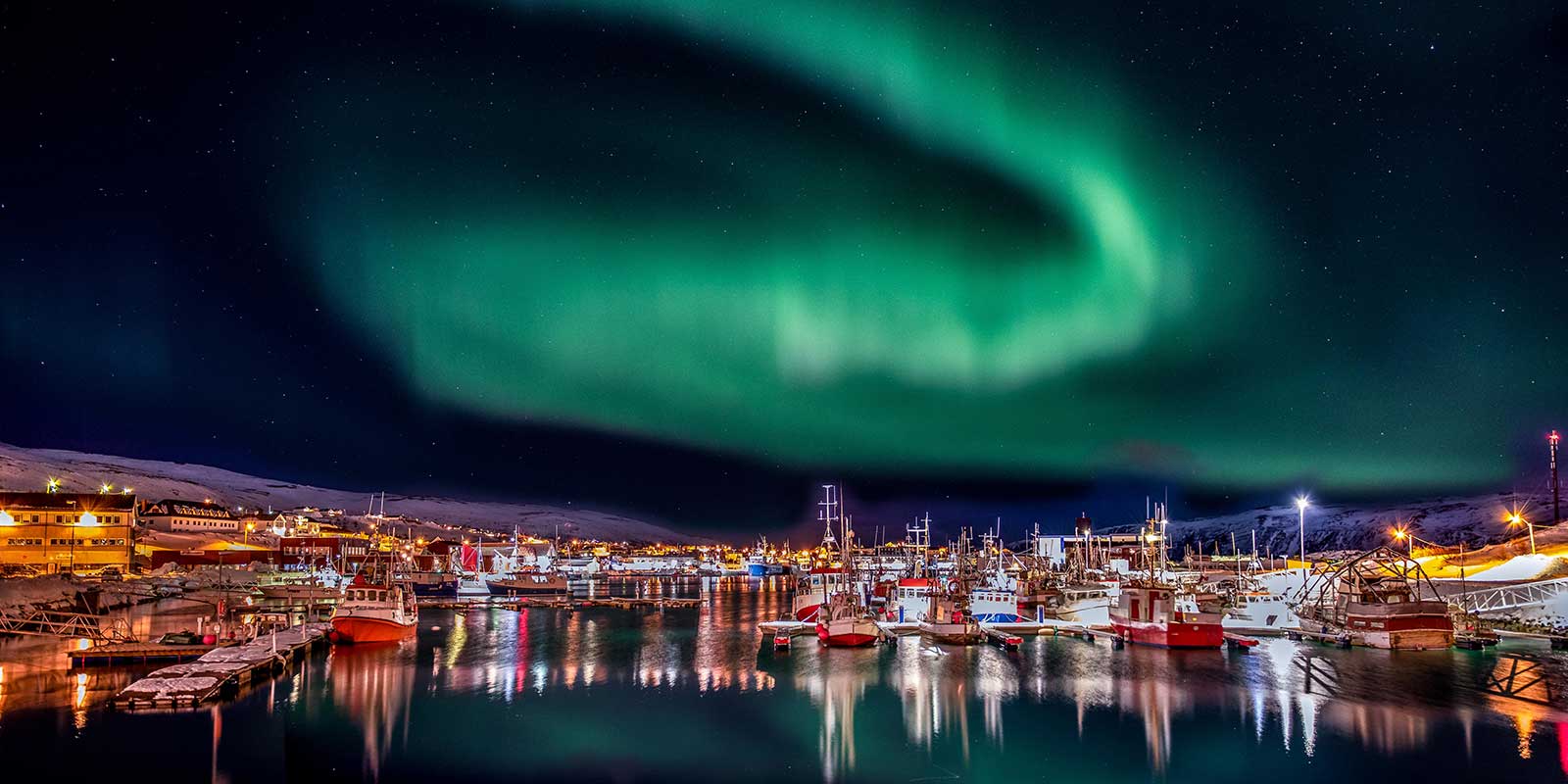 Northern Lights above Batsfjord Harbour in Finland