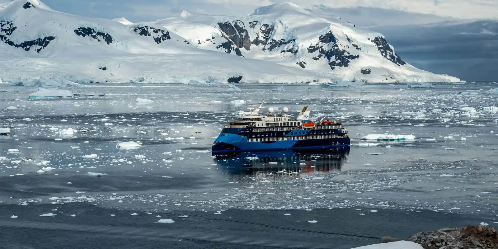 Aerial view of Ocean Victory in Neko Harbour, Antarctica.
