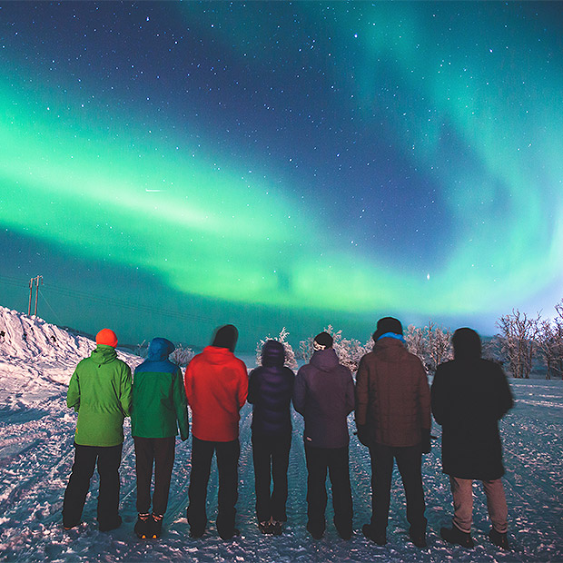 Group watching the northern lights