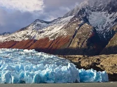 Grey Glacier in Chile, with the mountainous landscape in the background.