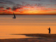 Fisherman at sunset in Vilaculos, Mozambique