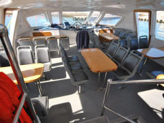 Catamaran used for whale watching boat trip in Hermanus, South Africa.
