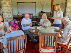 Nick Mackman running a sculpture workshop in Tanzania.