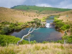 Landscape with man made waterfall