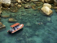 Snorkellers off of Orpheus Island, Queensland, Australia.