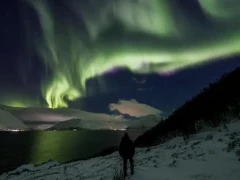 Viewing the Northern Lights on land, in Norway.