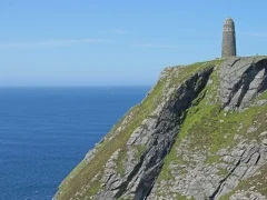 View of the American monument on the cliff at Mull of Oa, Scotland.