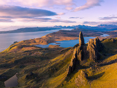 Old Man of Storr with the Black Cuillin Mountains behind. 