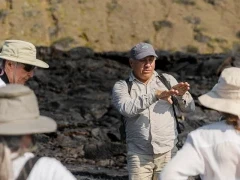 Guests with a guide on an excursion in the Galapagos.