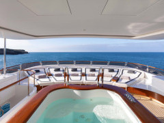 Sunbeds and hot tub on board Aqua Mare liveaboard in the Galapagos Islands.
