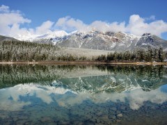 Pyramid mountain and reflection in Pyramid Lake near Jasper National Park, Canada