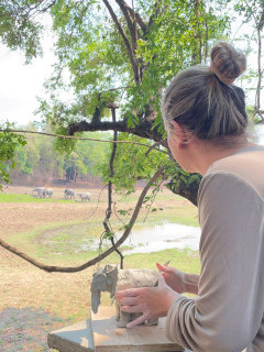 Client sculpting an elephant on our Wildlife Art Safari in South Luangwa, Zambia