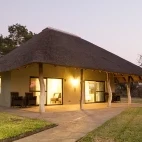 External view of a chalet at Senalala Safari Lodge, South Africa.
