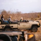 Guests out on a game drive in Klaserie Private Nature Reserve, South Africa.