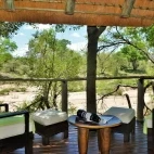 Suite's outdoor seating area, looking out at the savannah of Kruger National Park.