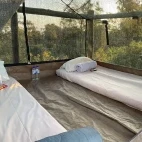 The tent accommodation out on the sleep-out deck at Rhino Post Safari Lodge. Observe wildlife in a new way.
