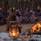 Local residents performing by the boma at Dulini River Lodge, Sabi Sands Private Game Reserve.