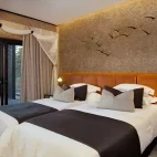 View of the second bedroom at Amber Villa, featuring outdoor seating area.