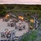 The outdoor boma area at Sabi Sabi Earth Lodge, for the outdoor dining experience.
