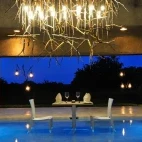 The day bar at Sabi Sabi Earth Lodge, where guests can enjoy lunch in the ankle-deep pool, for a cooling experience in the heat of the day.