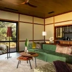 Stylish coffee station and seating in a guest suite at Tanda Tula, South Africa