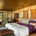 Interior suite area, complete with large bed and ample space to relax in after a day on safari at Tanda Tula, South Africa