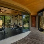 The gym facilities available at Tanda Tula, complete with stunning views of the bush.