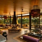 Lounge area, from the elevated bar area, at Tanda Tula, South Africa
