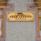 Sign for Snow Leopard Lodge in Ulley Valley, India.