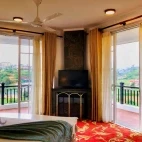 Bedroom with balcony, at The Blackpool Hotel, Sri Lanka.