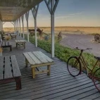 Outdoor decking area with seating, at Estancia Rincon Chico, Argentina.