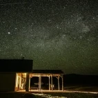 External view of La Posta de Los Toldos at night, in Argentina.