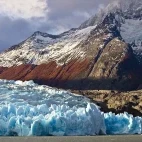 Grey Glacier in Chile, with the mountainous landscape in the background.