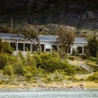External view of Hotel Lago Grey, from the water, Torres del Paine, Chile.