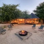 The indoor and outdoor seating areas at Dinaka Camp.