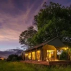 View of a guest tent at dusk, at Karangoma, Botswana.