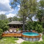 Aerial view of the main outdoor areas and pool, at Karangoma, Botswana.