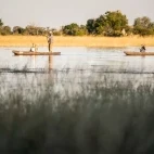 Exploring the Okavango Delta in Botswana by mokoro.