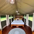 Interior view of a tent, at Loango Savannah Camp, Gabon
