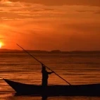 Silhouette of a fisherman on Lake Victoria, Kenya.