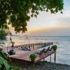 The lounge deck area at Mfangano Island Lodge on Lake Victoria, at sunset.