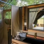A safari tent en suite bathroom at Chicari Camp, Gorongosa, Mozambique.