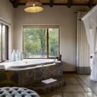 The en suite bathroom in a Bush Facing Suite at Arathusa Safari Lodge, South Africa