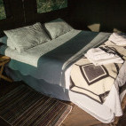 Bedroom at Bush Lark Mobile Tented Camp, Botswana