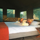 Tent interior in Bush Lark Mobile Tented Camp, Botswana