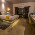 Bedroom at Pangolin Chobe Hotel in Botswana.