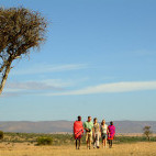 Walking safari with Masaai guides at Porini Mara Camp in Kenya